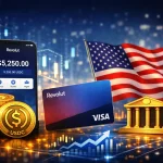 Smartphone displaying Revolut app with USDC balance beside stacked gold USDC coins, a Revolut Visa card, and a waving American flag; golden bank building and glowing circuit‑board graphics in the background, symbolizing US stablecoin banking.